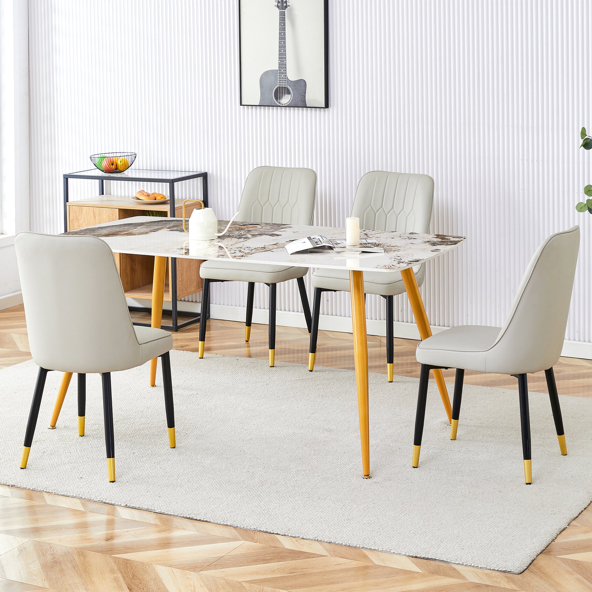 Table And Chair Set.Modern Minimalist Dining Table. White Imitation Marble Pattern Sintered Stone Desktop With Golden Metal Legs.Paried With 4 Comfortable Chairs With Pu Seats And Black Metal Legs.