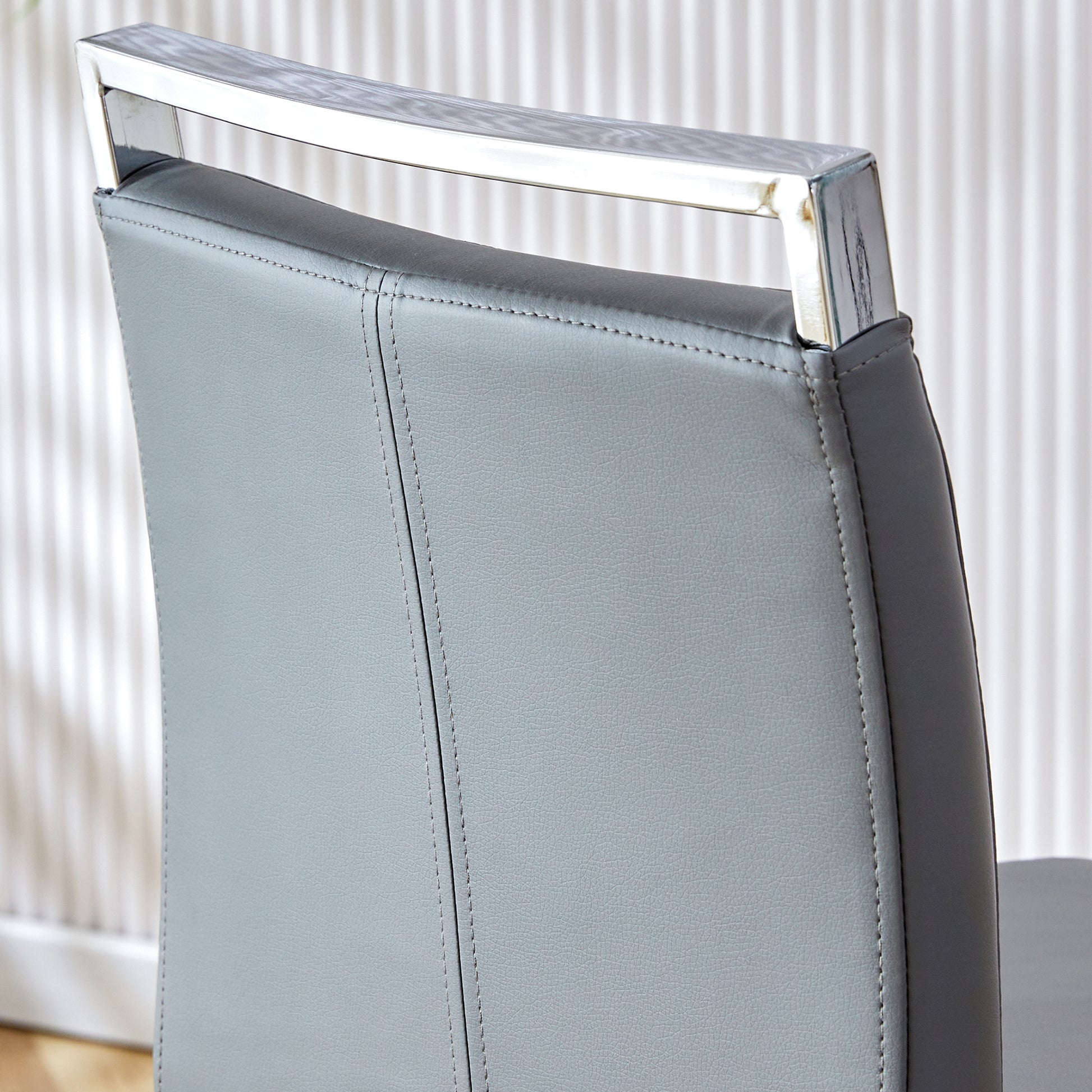 Table And Chair Set. A Rectangular Glass Dining Table With A 0.4 Inch Tempered Glass Tabletop And Mdf Board V Shaped Bracket, Paired With Chairs Consisting Of Pu Seat Cushions And Silver Metal Legs. Black Gray Seats 4 Tempered Glass