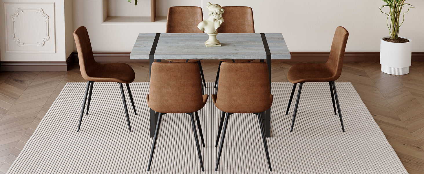 Table And Chair Set. Modern Minimalist Grey Marble Textured Mdf Dining Table With Metal Frame. Paired With 6 Chairs With Soft Suede Cushions And Black Metal Legs. Brown Seats 6 Mdf Metal