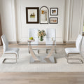 Table And Chair Set.Modern Dining Table,Tempered Glass Tabletop And Silver Colored Leg.Paired With 4 Soft And Comfortable White Pu Chair, Perfect For Dinner, Meetings, Home And Office Decor. White