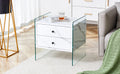 Double Drawer Bedside Table. The Board Surface Is Mdf Sticker, And Both Sides Are Transparent Tempered Glass. The Design Is Simple And Elegant, With Excellent Storage Functions. White Mdf