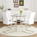 A Modern Minimalist Round Transparent Tempered Glass Table With Silver Metal Legs And 4 Modern Pu Leather High Backed Dining Chairs For A Luxurious Experience. White Seats 4 Glass Metal