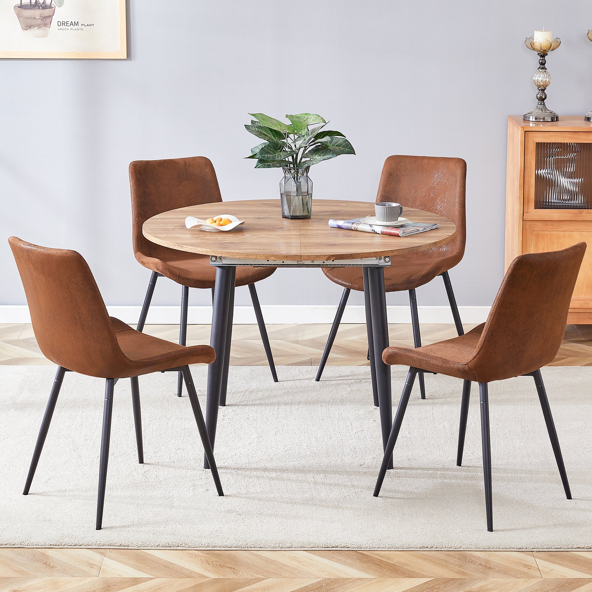 Table And Chair Set.Modern Extendable Mdf Dining Table.The Table Has A Telescopic Design, Suitable For Gatherings Of Different Size.Paired With 4 Chairs With Soft Suede Cushions And Black Metal