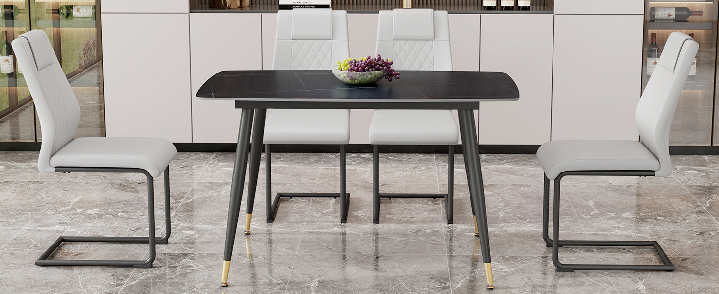 Table And Chair Set. Large Modern Rectangular Table With Black Textured Top And Black Metal Legs. Soft And Comfortable Pu Seats, Faux Leather Upholstered Seats And Sturdy Metal Legs. Grey Black Seats 4 Sintered Stone