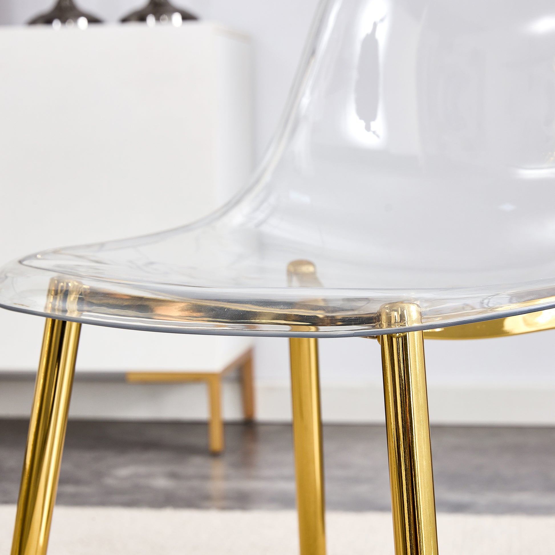 Table And Chair Set.Modern Rectangular Glass Dining Table With Tempered Glass Countertop And Golden Metal Legs, Paired With Multiple Transparent High Quality Pet Dining Chairs With Golden Legs. Gold Seats 6 Tempered Glass