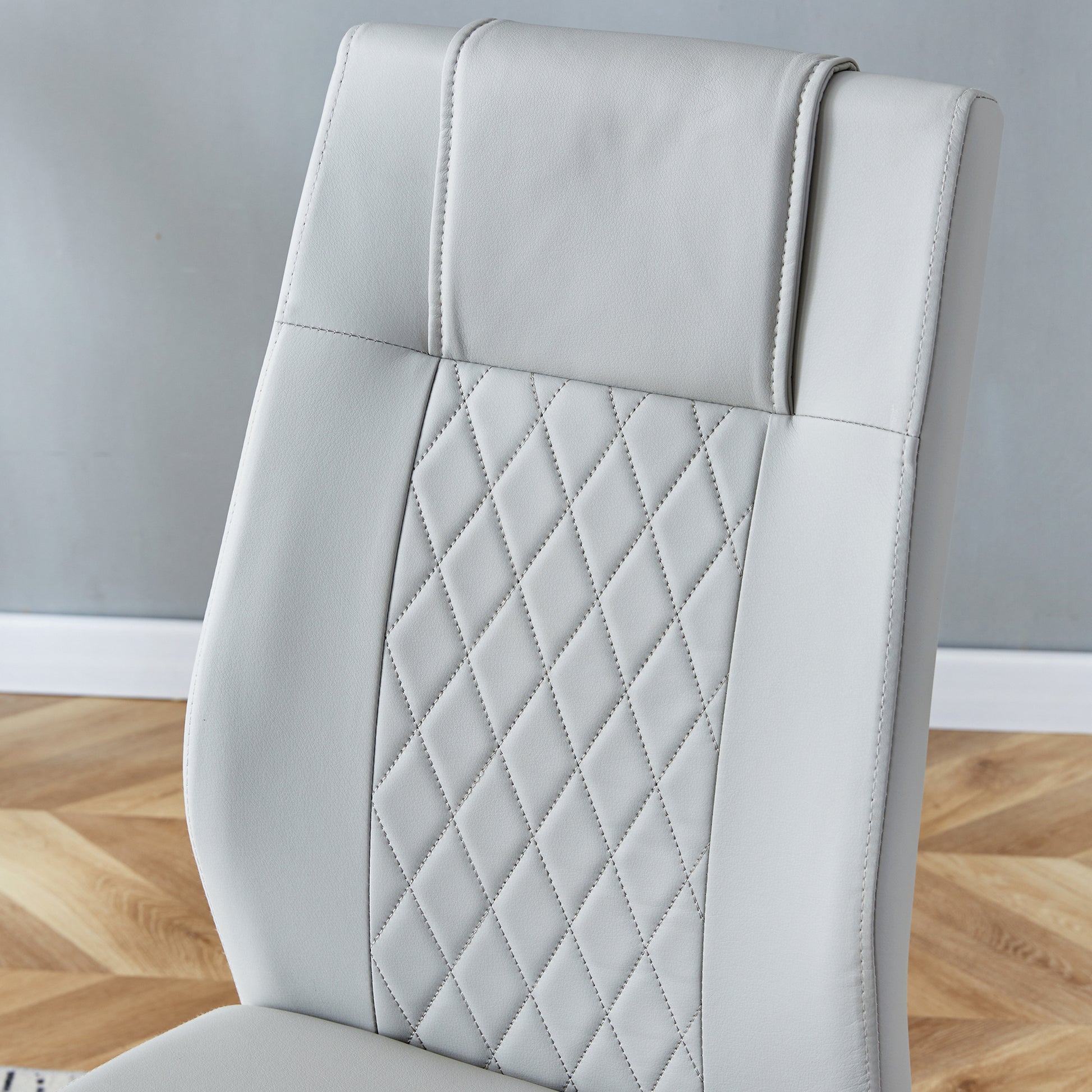 Table And Chair Set.36.6"Round Clear Glass Dining Table With A Unique Shape With Ring Shaped Gathered Silver Metal Legs.Paired With 4 Light Gray High Quality Pu Dining Chairs With Silver Metal Legs.