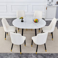 Table And Chair Set.Modern Extendable Mdf Dining Table.The Table Has A Telescopic Design, Suitable For Gatherings Of Different Size.Paired With 6 Chairs With Pu Cushions And Black Metal Legs. White Black Seats 6 Mdf Metal