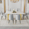 Table And Chair Set.The Table Has A Glass Top With Imitation Marble Pattern Stickers And Stainless Steel Golden Legs. Paried With Chairs With Pu Artificial Leather Backrest Cushions And Black Legs.