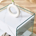 Bedside Table With Drawers. The Board Surface Is Mdf Sticker, And Both Sides Are Transparent Tempered Glass. The Design Is Simple And Elegant, With Excellent Storage Functions. White 1 Drawer Mdf Glass