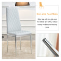 Table And Chair Set.Rectangular Dining Table With Tempered Glass Tabletop And Silver Plating Metal Legs.Paired With 6 Checkered Armless High Back Light Gray Chairs With Electroplated Metal Legs. Transparent Seats 6 Glass Metal