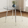 Round Dining Table With Glass Top, Silver Metal Legs, Exquisite Life, Starting From The Details, The Silver Legs Show An Extraordinary Texture, Which Is The Finishing Touch To Your Home Transparent Glass Metal