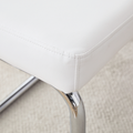 Table And Chair Set. Large Modern Rectangular Table With White Textured Top And Silver Metal Legs. Soft And Comfortable Pu Seats, Faux Leather Upholstered Seats And Sturdy Metal Legs. White Mdf Metal