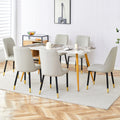 Table And Chair Set.Modern Minimalist Dining Table. White Imitation Marble Pattern Sintered Stone Desktop With Golden Metal Legs.Paried With 6 Comfortable Chairs With Pu Seats And Black Metal Legs.