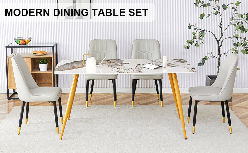 Table And Chair Set.Modern Minimalist Dining Table. White Imitation Marble Pattern Sintered Stone Desktop With Golden Metal Legs.Paried With 4 Comfortable Chairs With Pu Seats And Black Metal Legs.