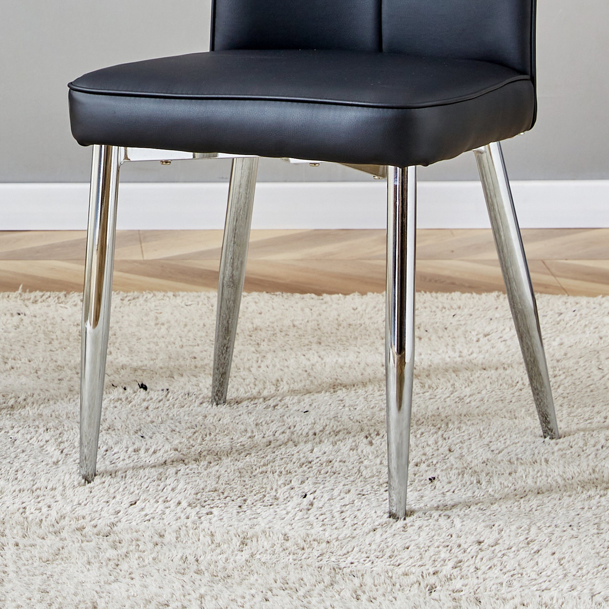 Table And Chair Set.63"X31.5X30" Black Marble Patterned Slabs Tabletop With Stainless Steel Butterfly Legs.Paired With 4 Black Pu Dining Chairs With A Vertical Stripe Design On The Backrest. Black