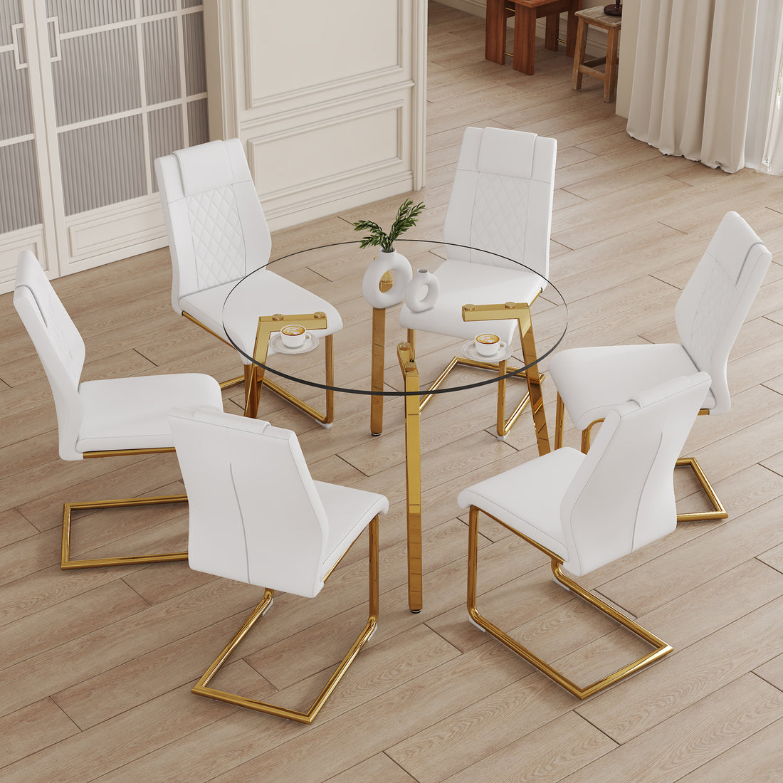 Table And Chair Set.A Modern Minimalist Style Round Clear Tempered Glass Table With Metal Legs.Paried With White Chairs With Modern Pu Leather High Back Upholstered And C Tube Golden Legs.