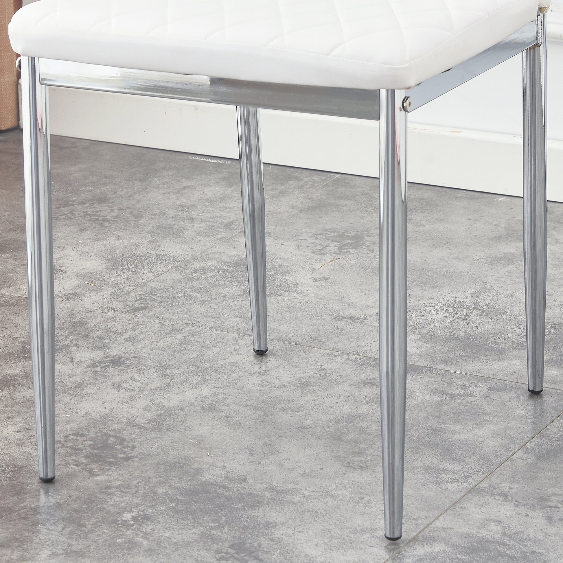 Table And Chair Set.Rectangular Dining Table With Tempered Glass Tabletop And Silver Plating Metal Legs.Paired With 6 Checkered Armless High Back White Chairs With Electroplated Metal Legs. White Seats 6 Glass Metal
