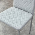 Table And Chair Set.Large Modern Rectangular Table With Brown Glass Top And Silver Metal Legs. Paired With 6 Light Gray Chairs With Checkered Armless High Back Pu Cushion And Silver Metal Legs. Light Gray,Silver Seats 6 Glass Metal