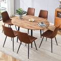 Table And Chair Set.Modern Extendable Mdf Dining Table.The Table Has A Telescopic Design, Suitable For Gatherings Of Different Size.Paired With 6 Chairs With Soft Suede Cushions And Black Metal