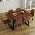 Table And Chair Set. A Minimalist Retro Rectangular Dining Table With A Specially Textured Top And Black Metal Legs, Paired With Soft Chairs And Black Metal Legs, Showcases A Beautiful Home Style. Brown Seats 6 Mdf Metal