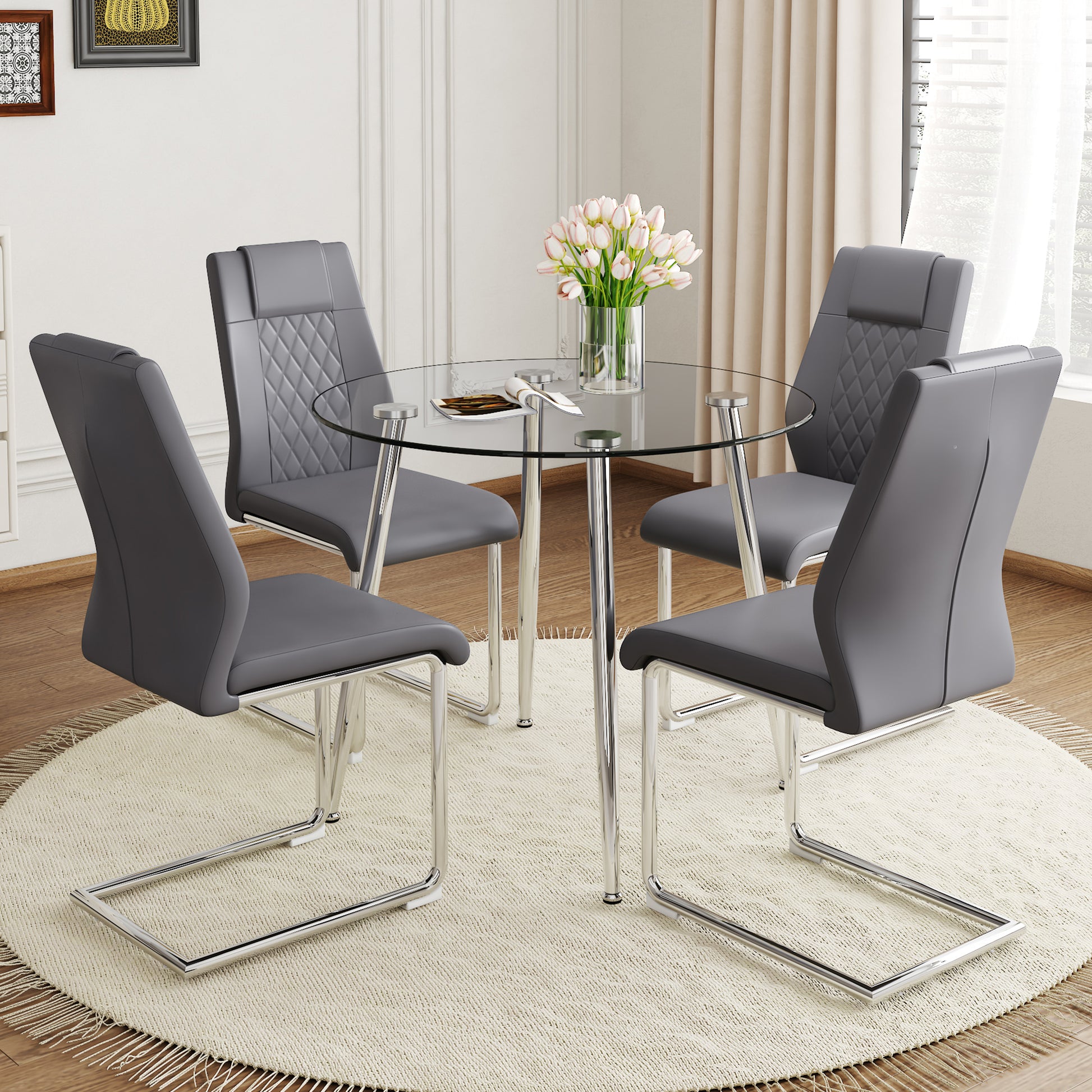 A Modern Minimalist Round Transparent Tempered Glass Table With Silver Metal Legs And 4 Modern Pu Leather High Backed Dining Chairs For A Luxurious Experience. Gray Seats 4 Glass Metal