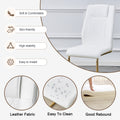 Table And Chair Set.The Table Has A Glass Tabletop With Imitation Marble Pattern Stickers And Stainless Steel Golden Table Legs. Paried With Comfortable Chairs With Pu Seats And Metal Legs. White