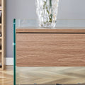 Bedside Table With Drawers. The Board Surface Is Mdf Sticker, And Both Sides Are Transparent Tempered Glass. The Design Is Simple And Elegant, With Excellent Storage Functions. Wood 1 Drawer Mdf Glass