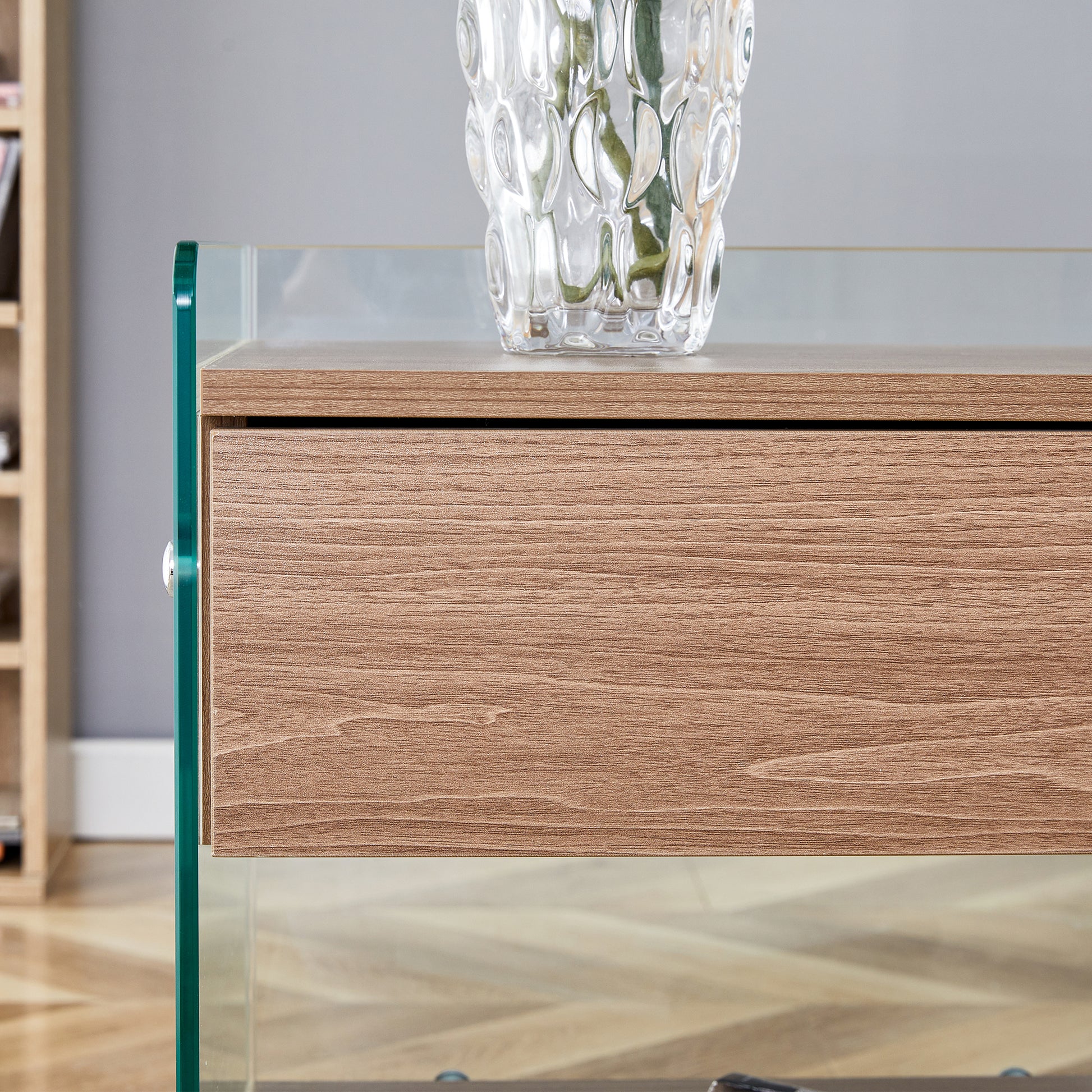 Bedside Table With Drawers. The Board Surface Is Mdf Sticker, And Both Sides Are Transparent Tempered Glass. The Design Is Simple And Elegant, With Excellent Storage Functions. Wood 1 Drawer Mdf Glass