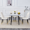 Table And Chair Set.Modern Extendable Mdf Dining Table.The Table Has A Telescopic Design, Suitable For Gatherings Of Different Size.Paired With 4 Chairs With Pu Cushions And Black Metal Legs. White Black Seats 4 Mdf Metal