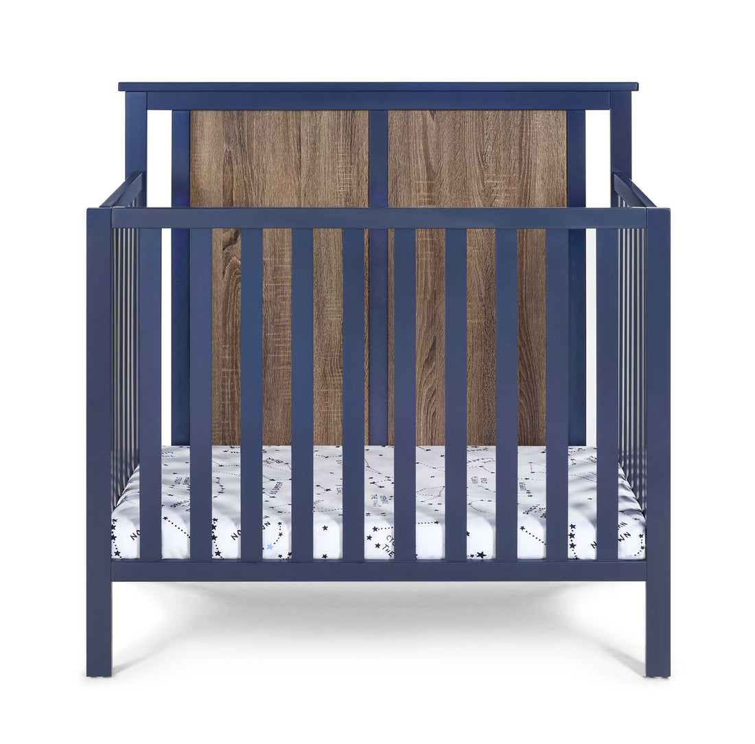 Connelly Mini Crib With Mattress Pad Midnight Blue Vintage Walnut Blue Brown Wood