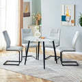 Table And Chair Set. Large Modern White Imitation Marble Patterned Round Table With Black Metal Legs. Nice Minimalism, Comfortable Seats And Black Metal Legs. White Gray Seats 4 Glass Metal