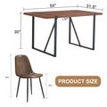 Table And Chair Set. A Minimalist Retro Rectangular Dining Table With A Specially Textured Top And Black Metal Legs, Paired With Soft Chairs And Black Metal Legs, Showcases A Beautiful Home Style. Brown Seats 6 Mdf Metal