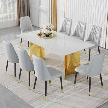 Table And Chair Set.The Table Has A Glass Top With Imitation Marble Pattern Stickers And Stainless Steel Golden Legs. Paried With Chairs With Pu Artificial Leather Backrest Cushions And Black Legs. White Gold Seats 8 Glass Metal