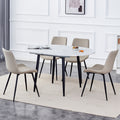 Table And Chair Set.Modern Extendable Mdf Dining Table.The Table Has A Telescopic Design, Suitable For Gatherings Of Different Size.Paired With 4 Chairs With Pu Cushions And Black Metal Legs. White Black Seats 4 Mdf Metal