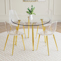 A Modern Minimalist Style Round Transparent Tempered Glass Table With Gold Metal Legs, Paired With 4 Modern Style Transparent Dining Chairs For A Luxurious Experience. Transparent Seats 4 Glass