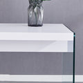 The Top Of The Coffee Table Is Made Of Mdf And White Stickers, And The Sides Are Clear Tempered Glass. The Design Is Simple And Elegant, And The Structure Is Strong. White Mdf Glass