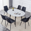 Table And Chair Set.Modern Extendable Mdf Dining Table.The Table Has A Telescopic Design, Suitable For Gatherings Of Different Size.Paired With 6 Chairs With Pu Cushions And Black Metal Legs.