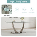 Table And Chair Set. Large Modern Rectangular Table With Glass Top And Silver Metal Legs. Furnished With Soft And Comfortable Pu Chairs With Faux Leather Upholstered Seats And Silver Metal Legs. Black Silver Seats 8 Glass Metal