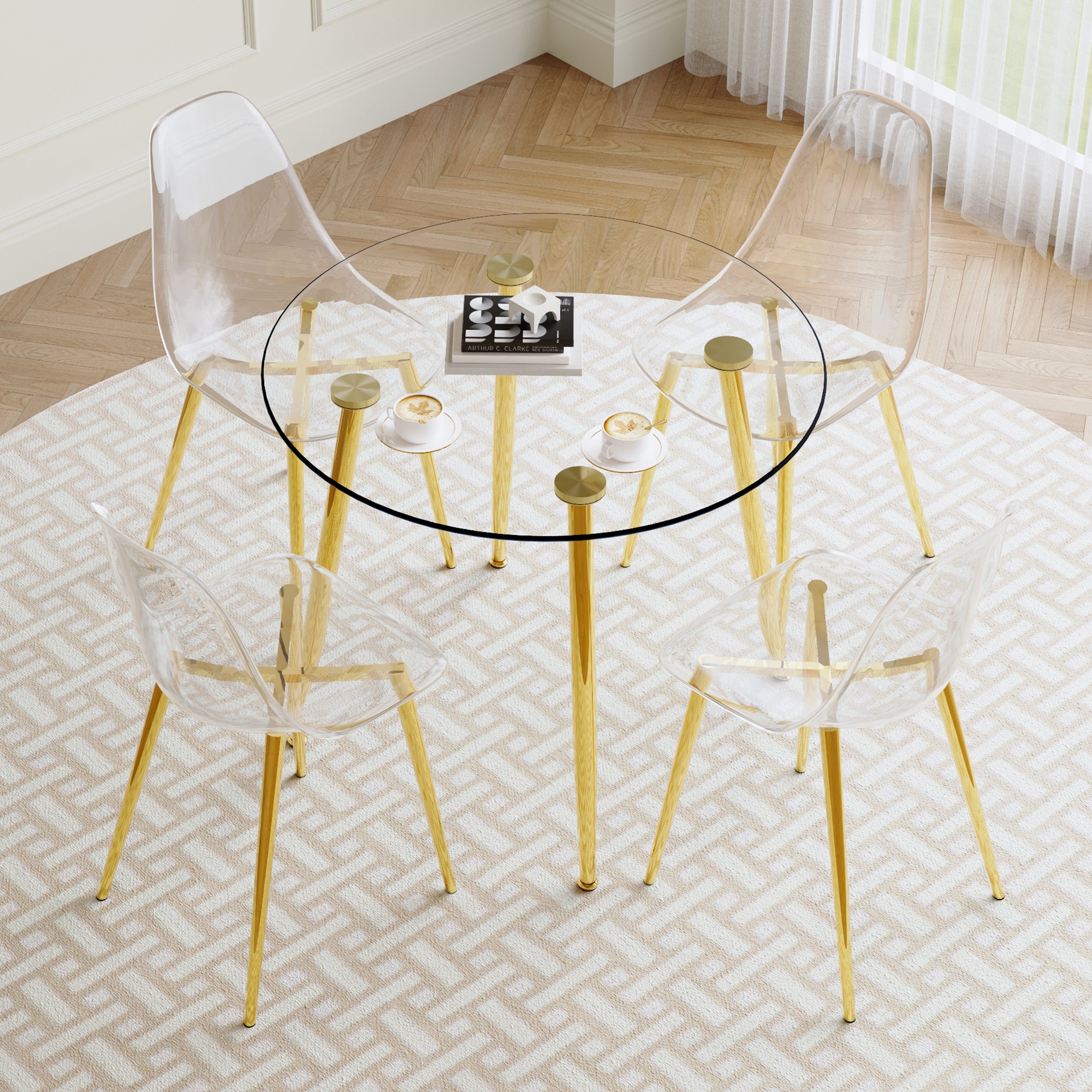 A Modern Minimalist Style Round Transparent Tempered Glass Table With Gold Metal Legs,Paired With 4 Modern Style Transparent Dining Chairs For A Luxurious Experience. Transparent Seats 4 Glass