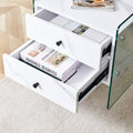 Double Drawer Bedside Table. The Board Surface Is Mdf Sticker, And Both Sides Are Transparent Tempered Glass. The Design Is Simple And Elegant, With Excellent Storage Functions. White Mdf