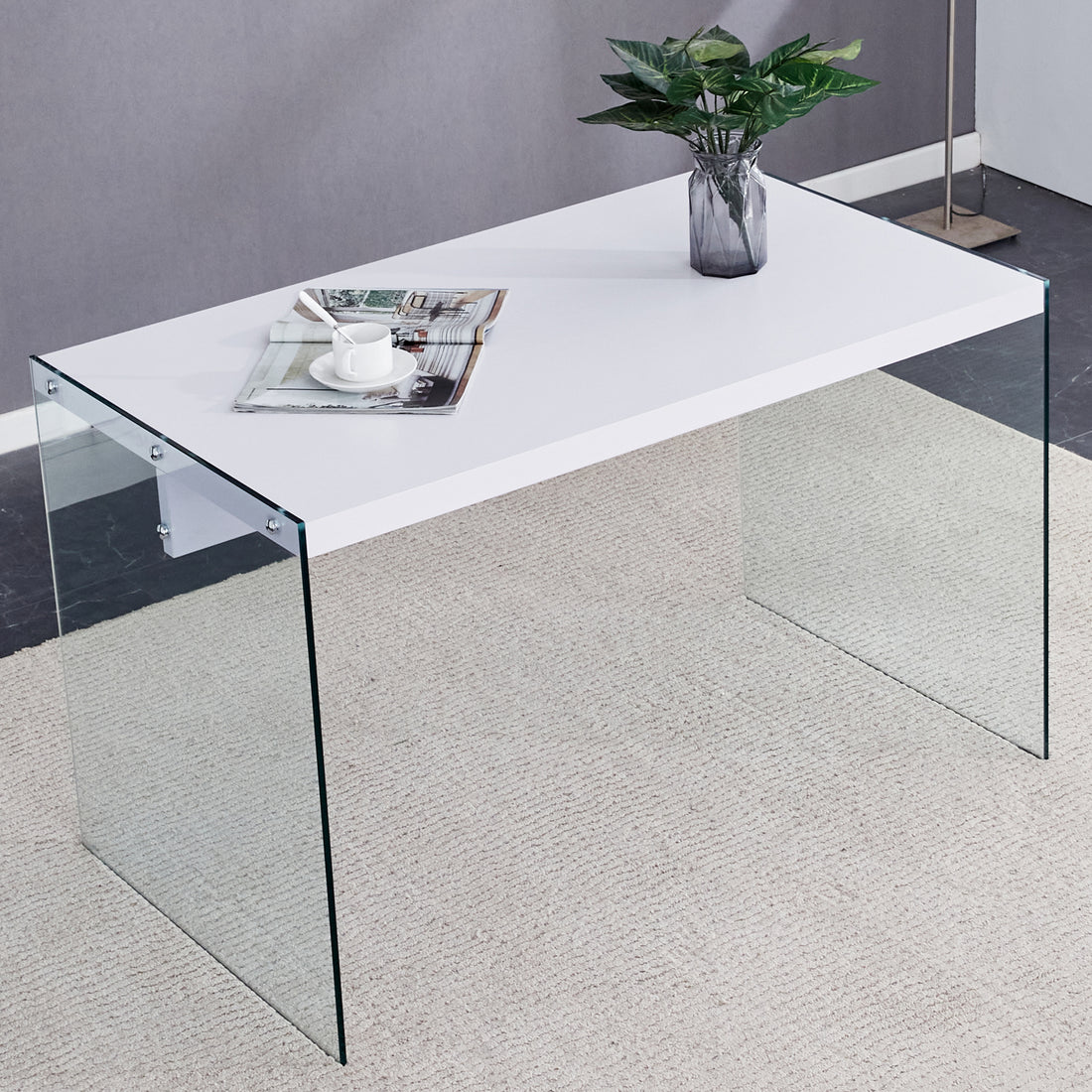 The Top Of The Coffee Table Is Made Of Mdf And White Stickers, And The Sides Are Clear Tempered Glass. The Design Is Simple And Elegant, And The Structure Is Strong. White Mdf Glass