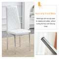 Table And Chair Set.Rectangular Dining Table With Tempered Glass Tabletop And Silver Plating Metal Legs.Paired With 6 Checkered Armless High Back White Chairs With Electroplated Metal Legs. White Seats 6 Glass Metal