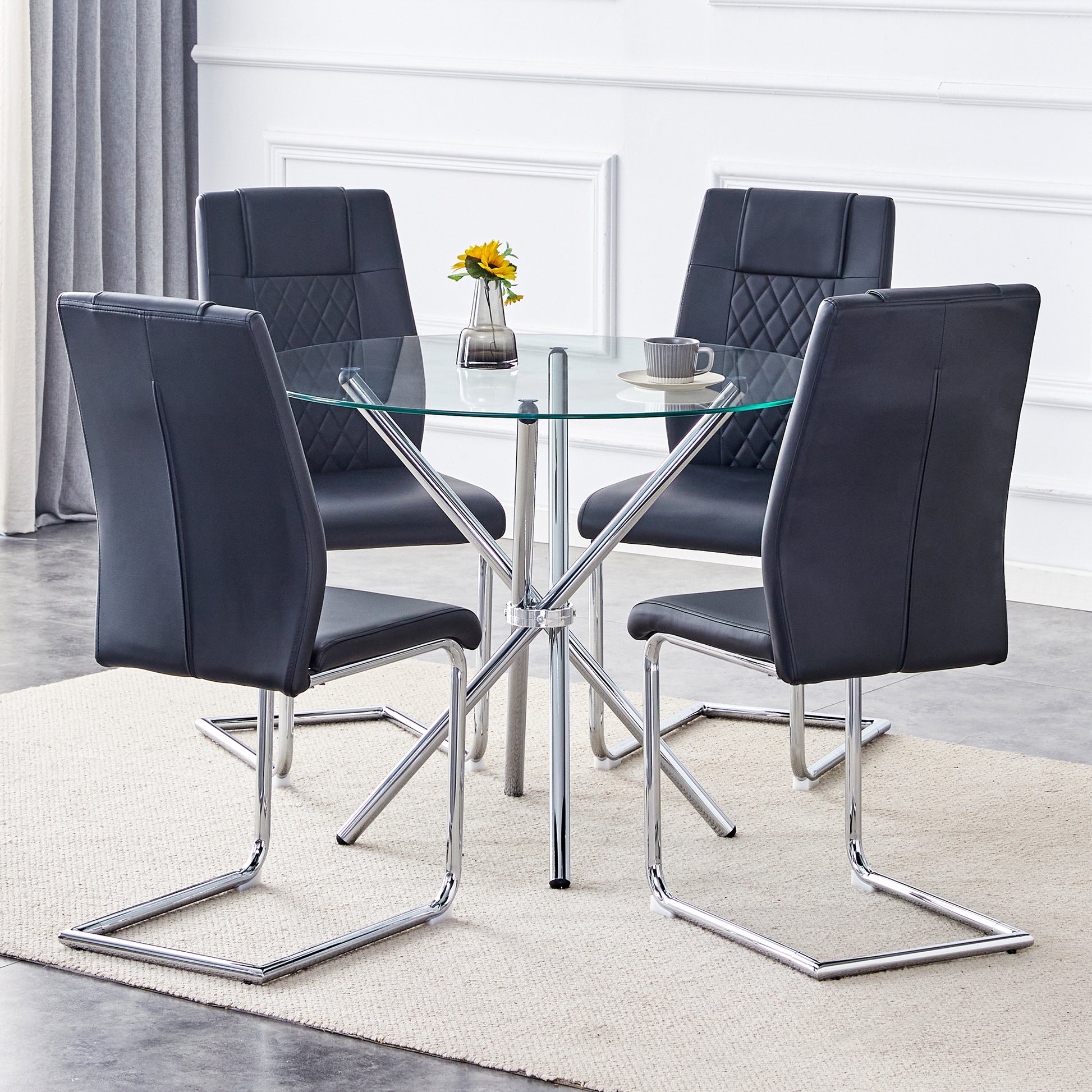 Table And Chair Set.36.6"Round Clear Glass Dining Table With A Unique Shape With Ring Shaped Gathered Silver Metal Legs.Paired With 4 Black High Quality Pu Dining Chairs With Silver Metal Legs.