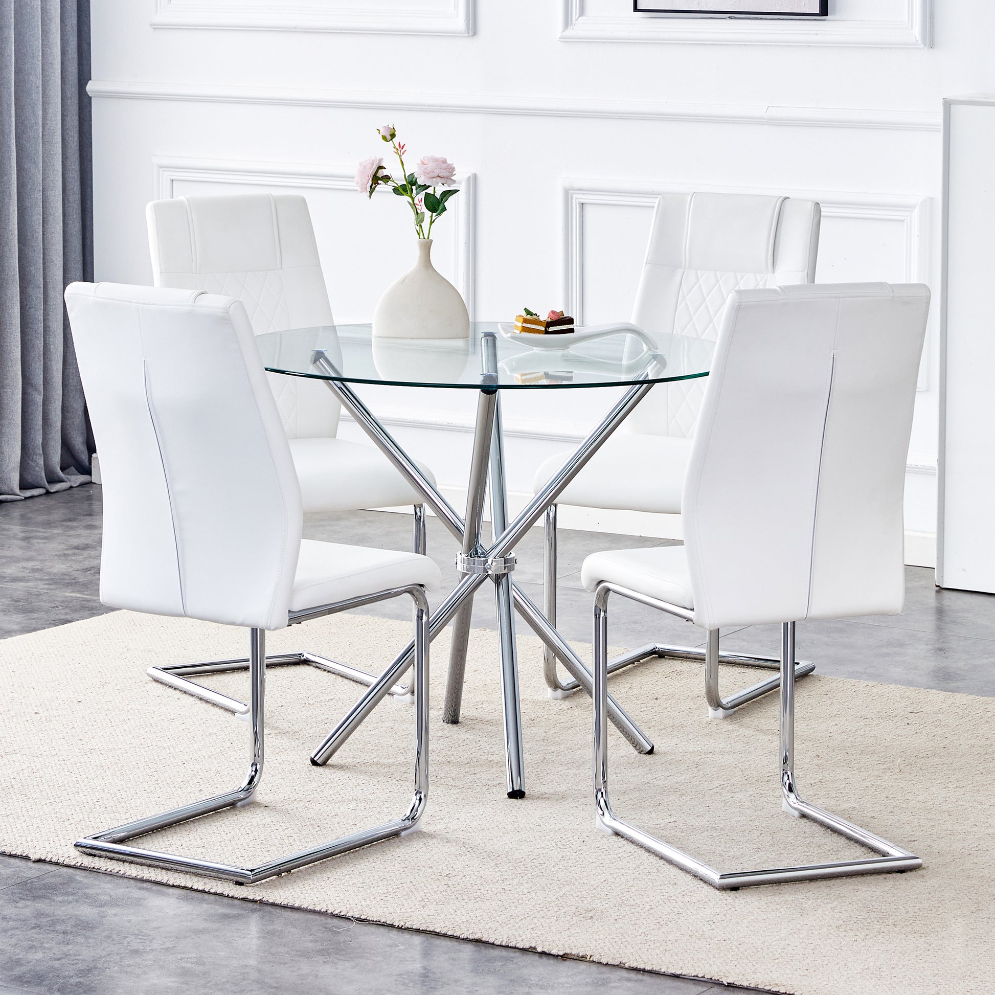 Table And Chair Set.36.6"Round Clear Glass Dining Table With A Unique Shape With Ring Shaped Gathered Silver Metal Legs.Paired With 4 White High Quality Pu Dining Chairs With Silver Metal Legs.